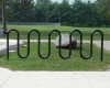 Picture of 11 Space Single Wave Bike Rack - Quick Ship - Black Powder Coated - In-ground or Surface Mount